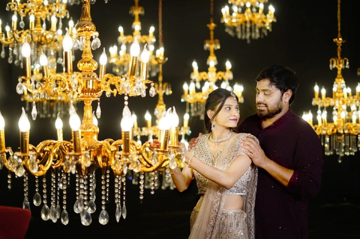 Bride and groom looking each other and posing for their pre-wedding photoshoot at Bangalore Film City.