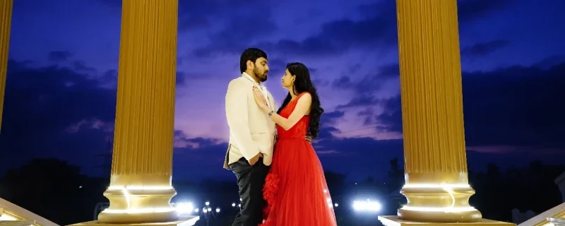 Groom and bride posing on their pre-wedding photoshoot at Bangalore Film City.